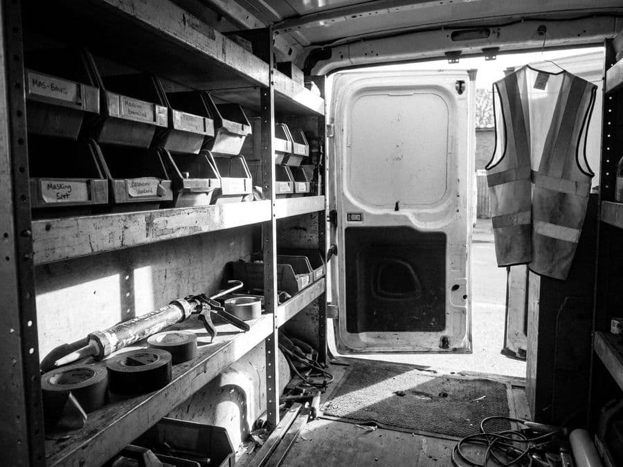 Shelving and tools inside a tradesman's van.